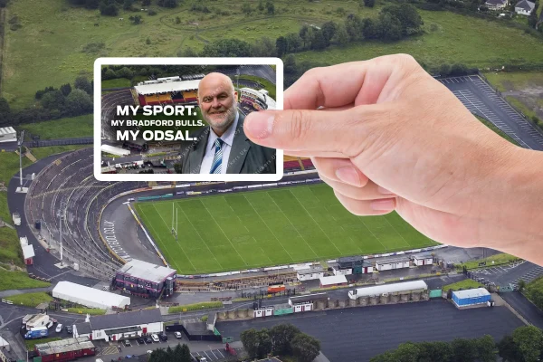 Hand Holding the same Nigel Wood Sticker